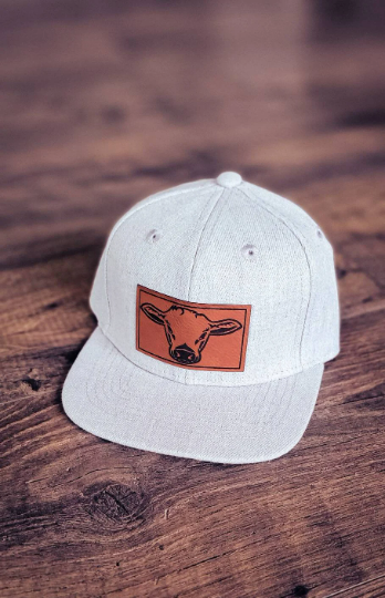 Cow patch snapback: Rounded trucker hat / Tiny